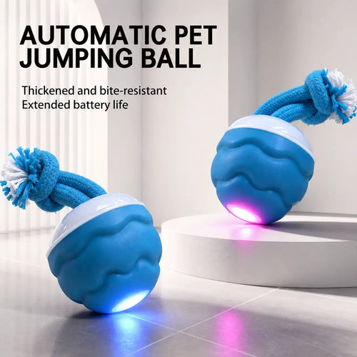Blue LED automatic jumping dog ball toy on a floor, glowing in pink light mode