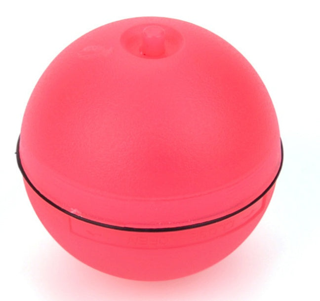 Pink LED cat ball toy close-up front view showing the top charging port