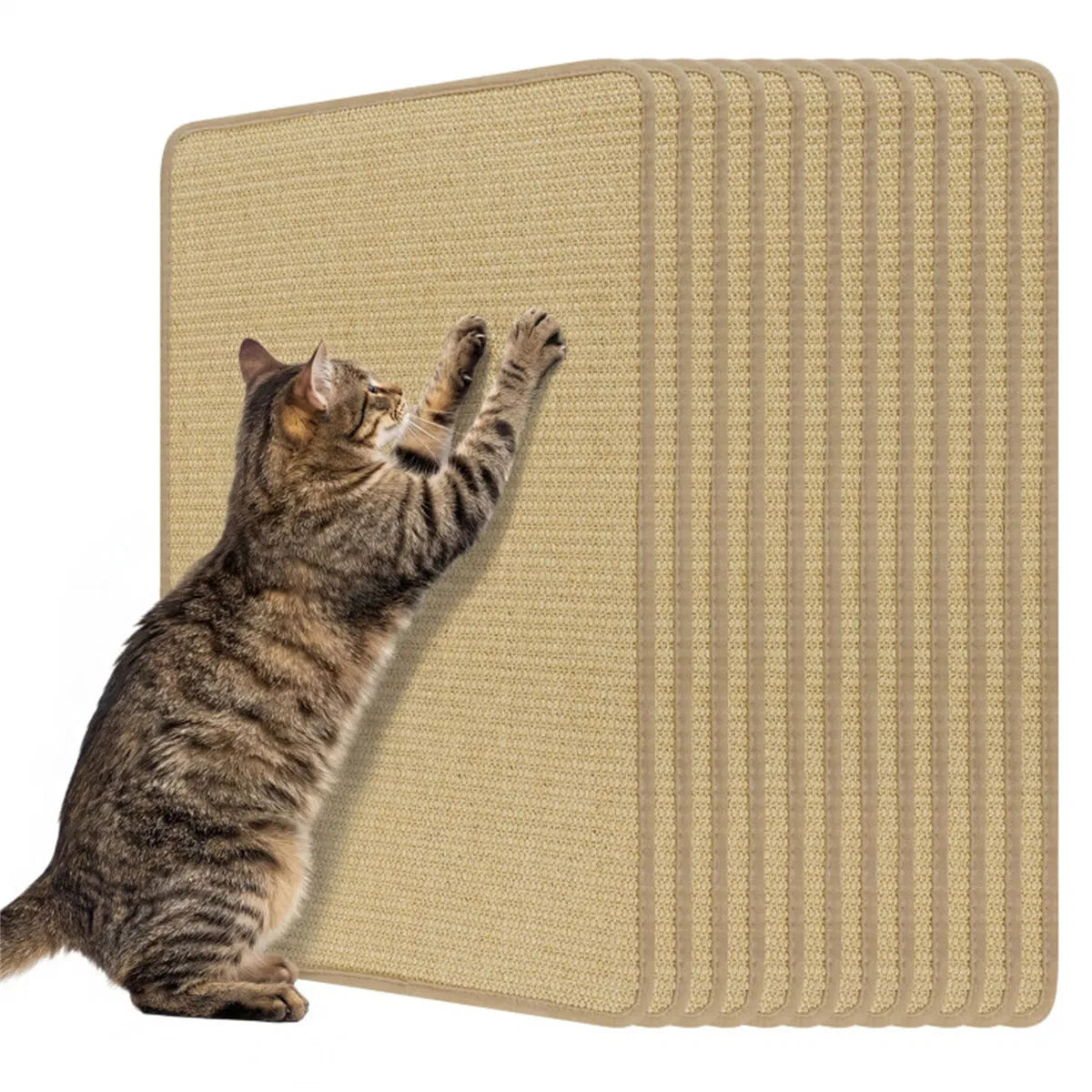 Gray tabby cat scratching a sisal mat mounted on furniture edge with a stack of mats visible