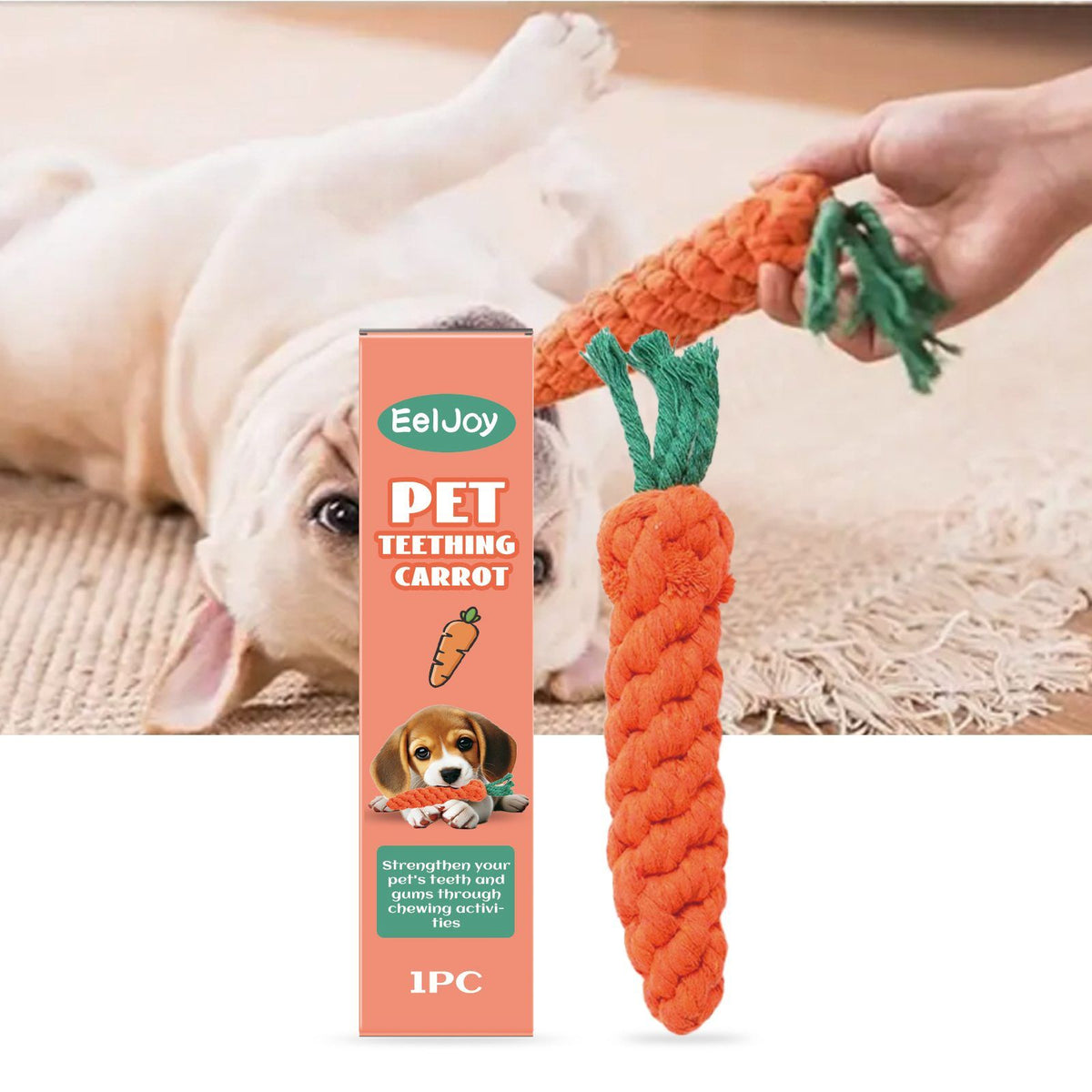 Bulldog playing tug with a hand holding the carrot-shaped chew toy on a rug
