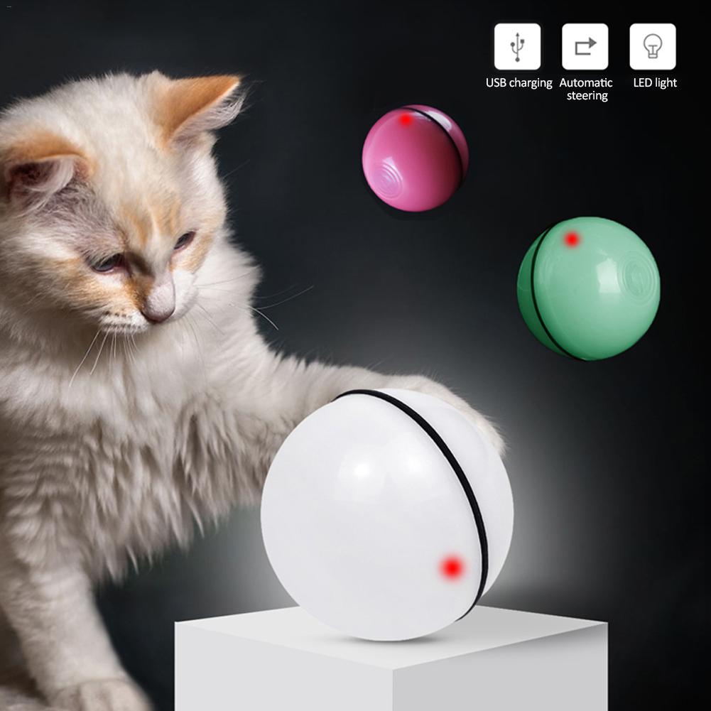 White LED laser ball toy on a pedestal with a cat pouncing, showing pink and green color options